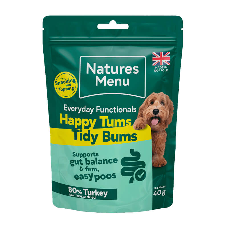 A green pouch of Natures Menu Everyday Functionals Happy Tums Tidy Bums 40g dog treats.