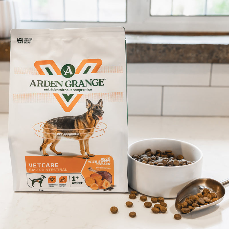 Arden Grange VetCare Gastrointestinal Dog Dry Food with kibble and scoop on a countertop.