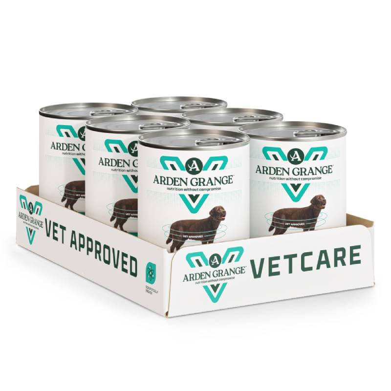 Six cans of Arden Grange VetCare Hypoallergenic Dog Food, 395g each, in a white tray.