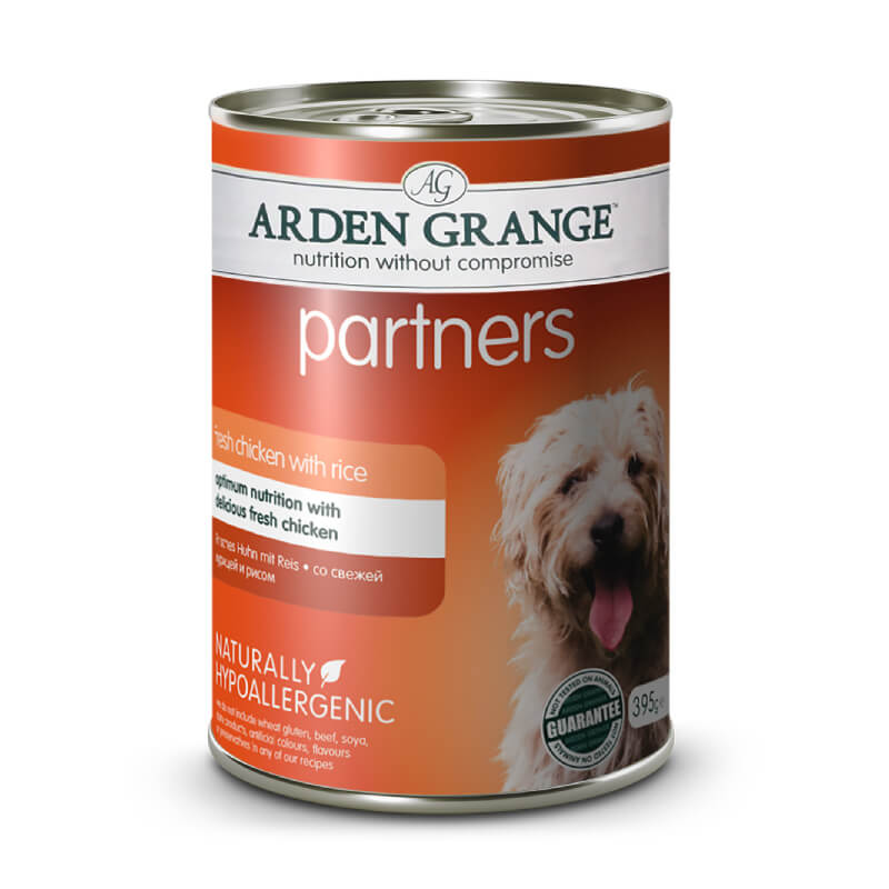 Arden Grange Partners Dog Chicken &amp; Rice 395g can beside a dog.