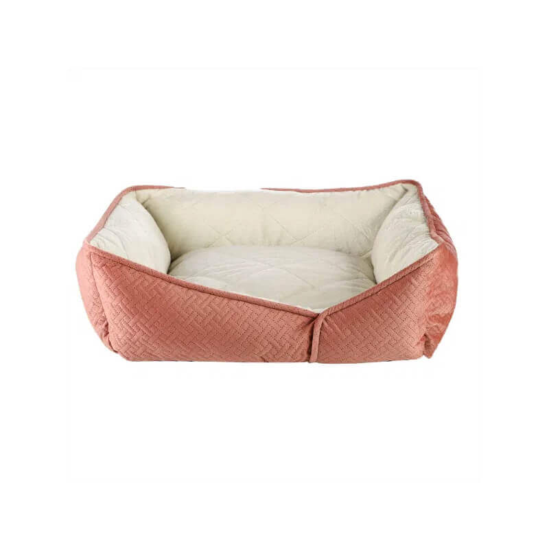 Dream Paws Coral Geometric Shape Sofa Bed—pink and cream with raised sides, rectangular.