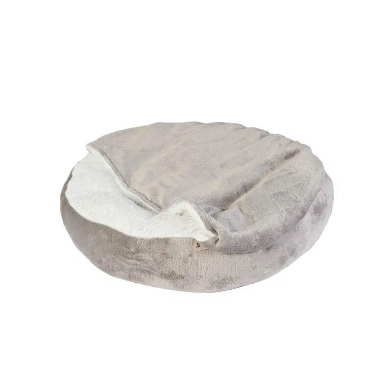 Dream Paws Cozy Hideaway Snuggle Pet Bed with Sherpa fleece lining and partially covered top.