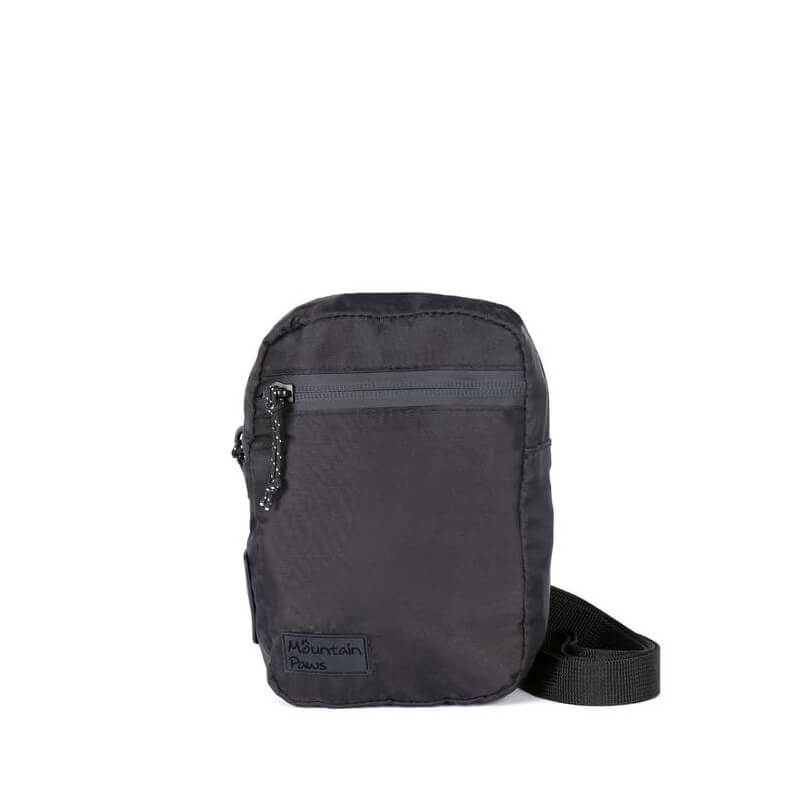 Mountain Paws Dog Snack Pack: black pouch with front zipper, dispenser, and adjustable strap.