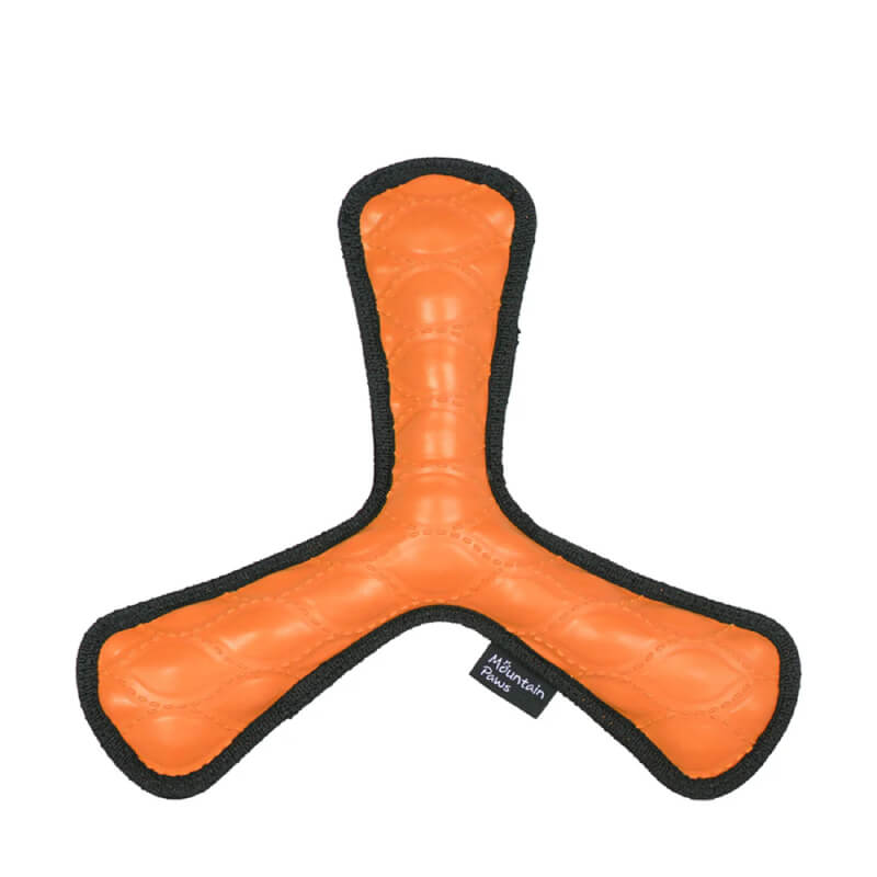 Mountain Paws Rubber Throw Dog Toy: Durable orange toy with black trim and a fabric tag.