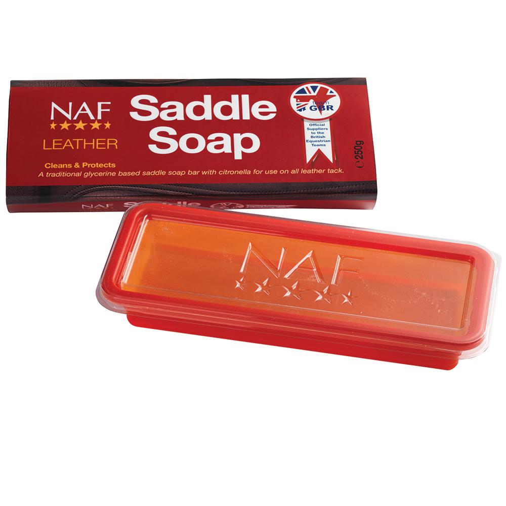 Red NAF Leather Saddle Soap 250g box with lid off, showing orange soap for saddle care inside.