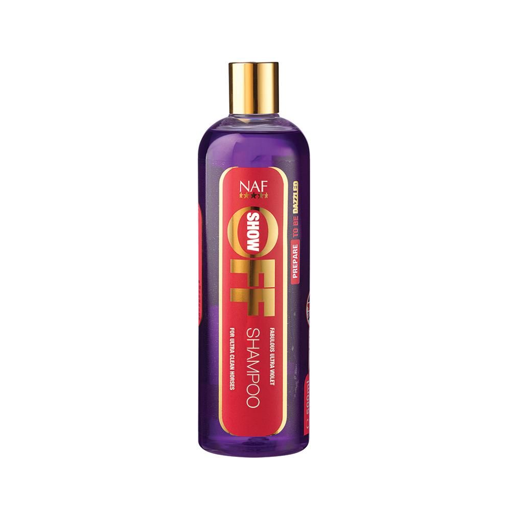 Purple bottle of NAF Show Off Shampoo by NAF with a gold cap.