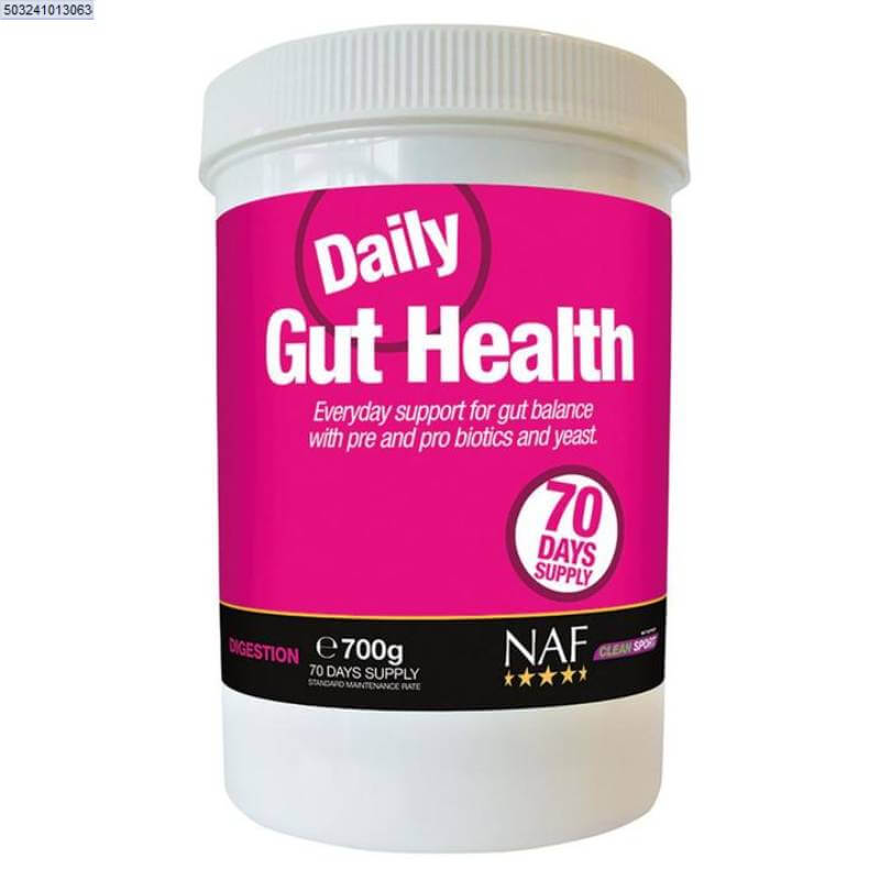 White container of NAF Daily Gut Health 700g probiotic yeast for horses on a pink background.