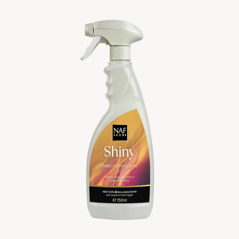 A white spray bottle of NAF Shiny Coat Grooming Spray 750ml for shiny pet coats.