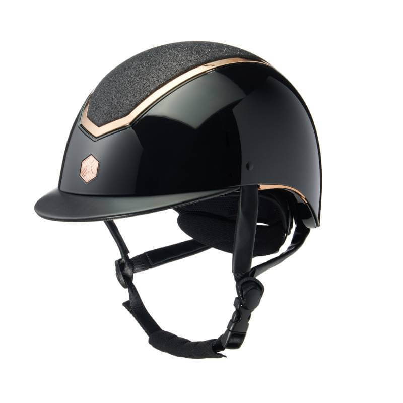 The EQX by Charles Owen Kylo is a black gloss helmet with rose gold sparkly detailing and dial-fit.