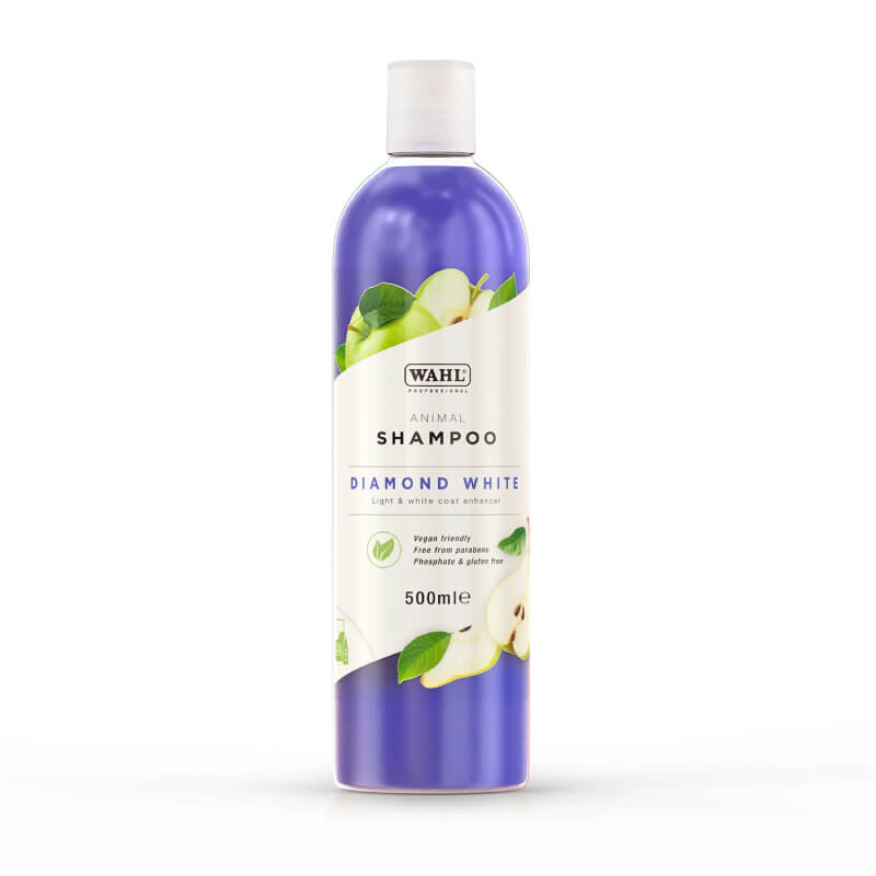 A 500ml bottle of Wahl Diamond White Shampoo with light purple liquid inside.