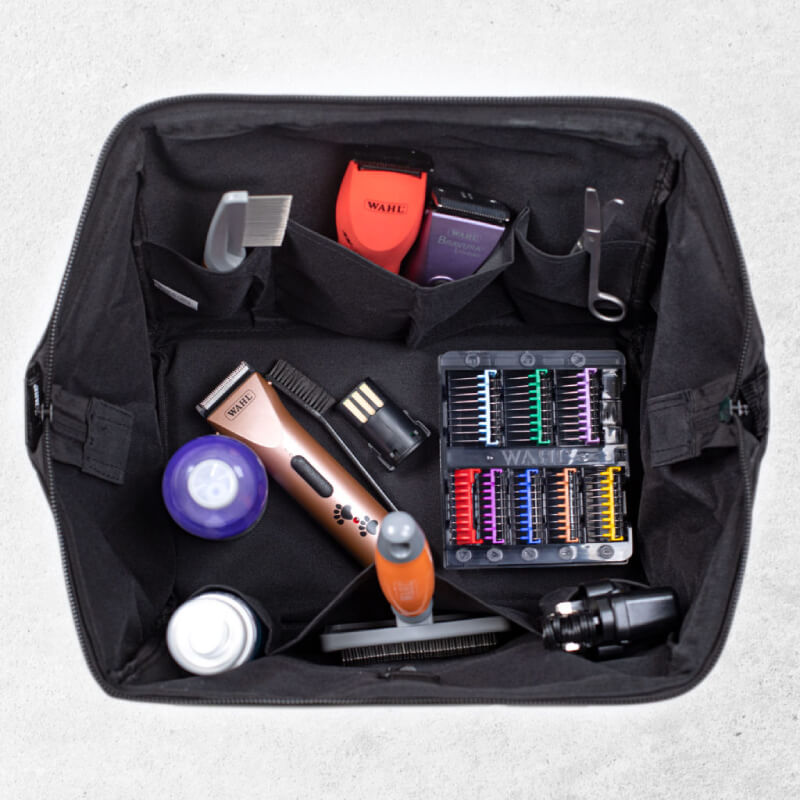 Wahl Paw Print Grooming Bag includes clippers, scissors, combs, guards & grooming supplies.