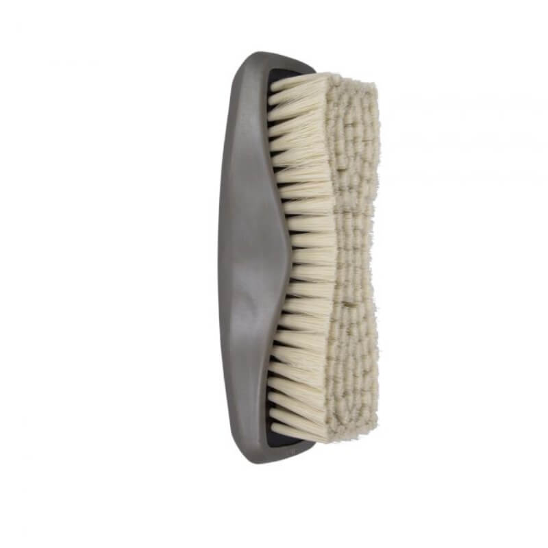 The Wahl Face Brush has a gray handle and soft bristles, shown from the side on white background.