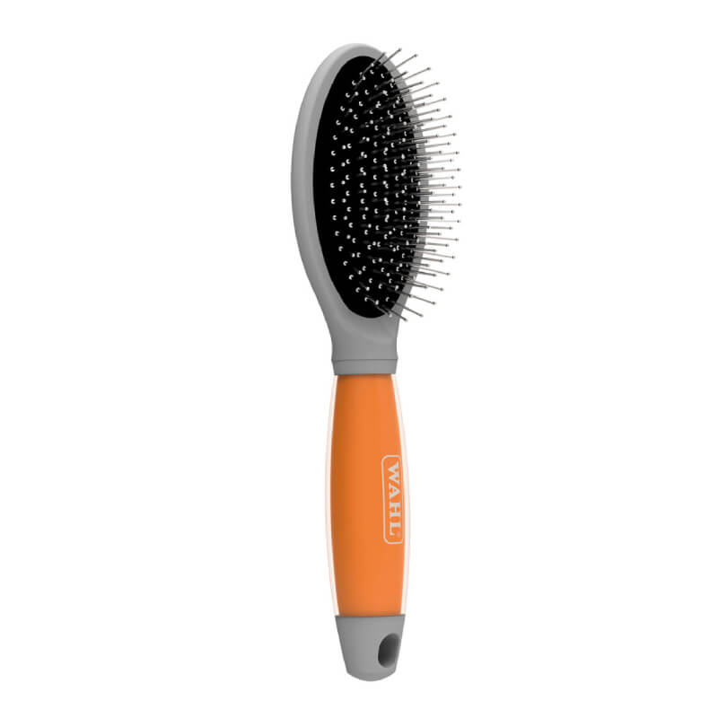 Wahl Pin Brush Orange Gel Handle with stainless steel bristles and ergonomic design.