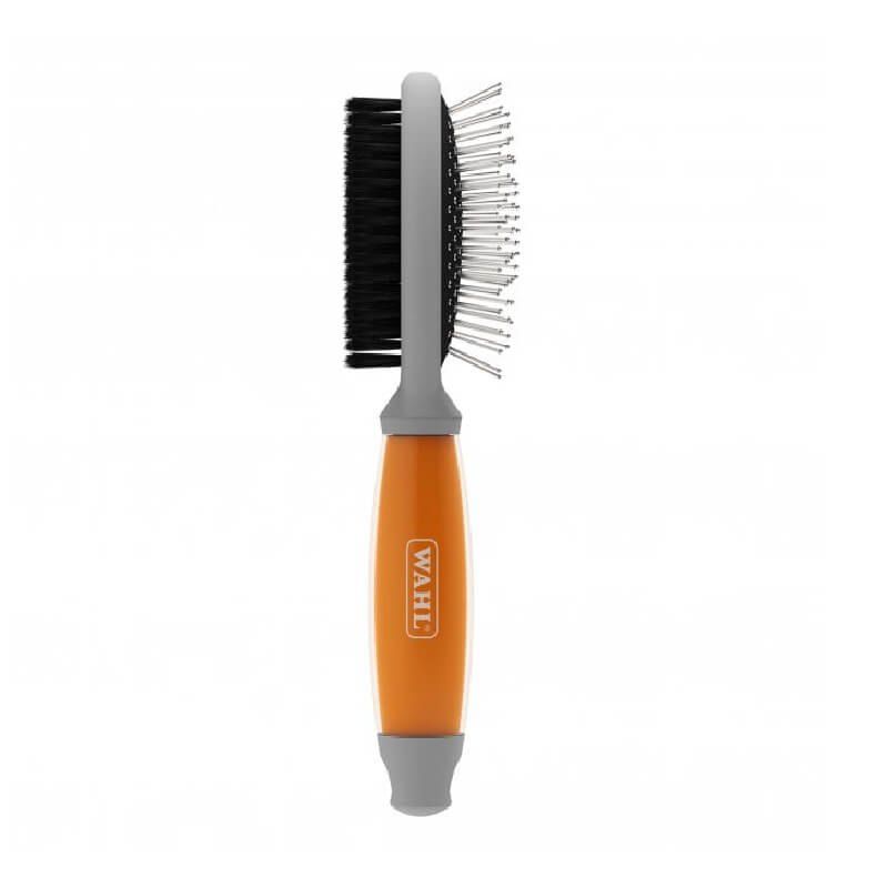 Wahl Double Sided Brush has an orange gel handle, bristles on one side, metal pins on the other.