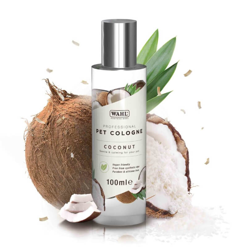 Wahl Pet Cologne Coconut deodoriser with coconut pieces in a Wahl bottle.