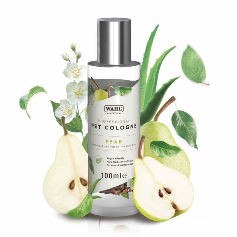 Wahl Pet Cologne Pear by Wahl, with a pear scent, shown among fresh pears and leaves.