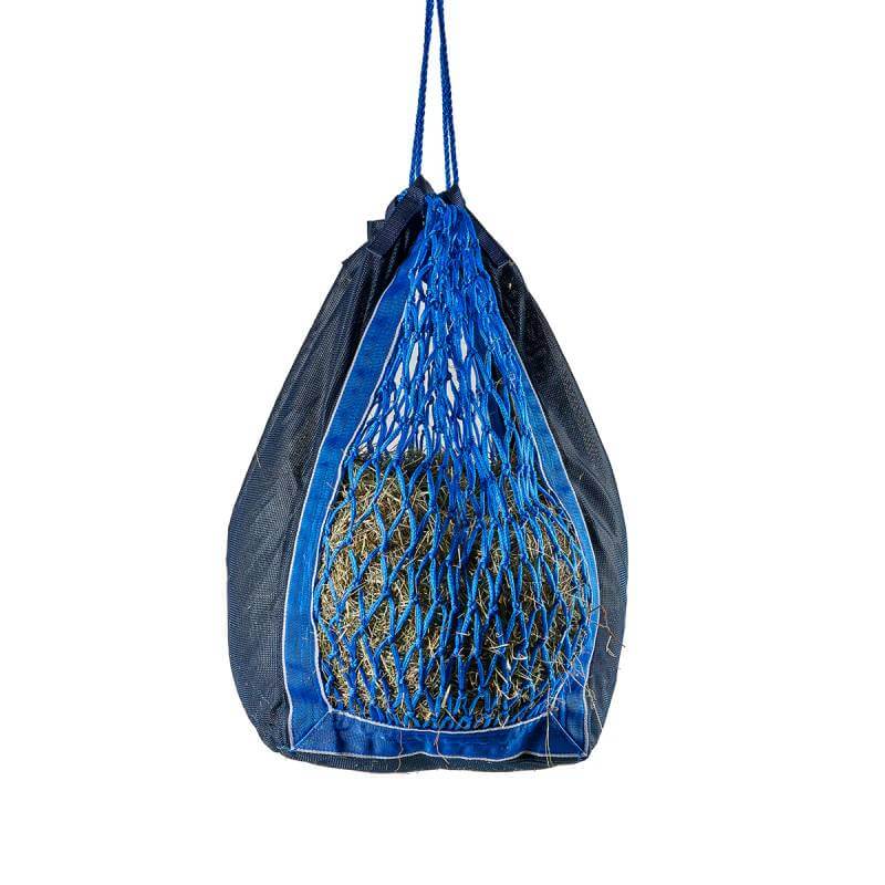 The Shires All Mesh Hay Bag hangs by a sturdy blue rope and is filled with hay.