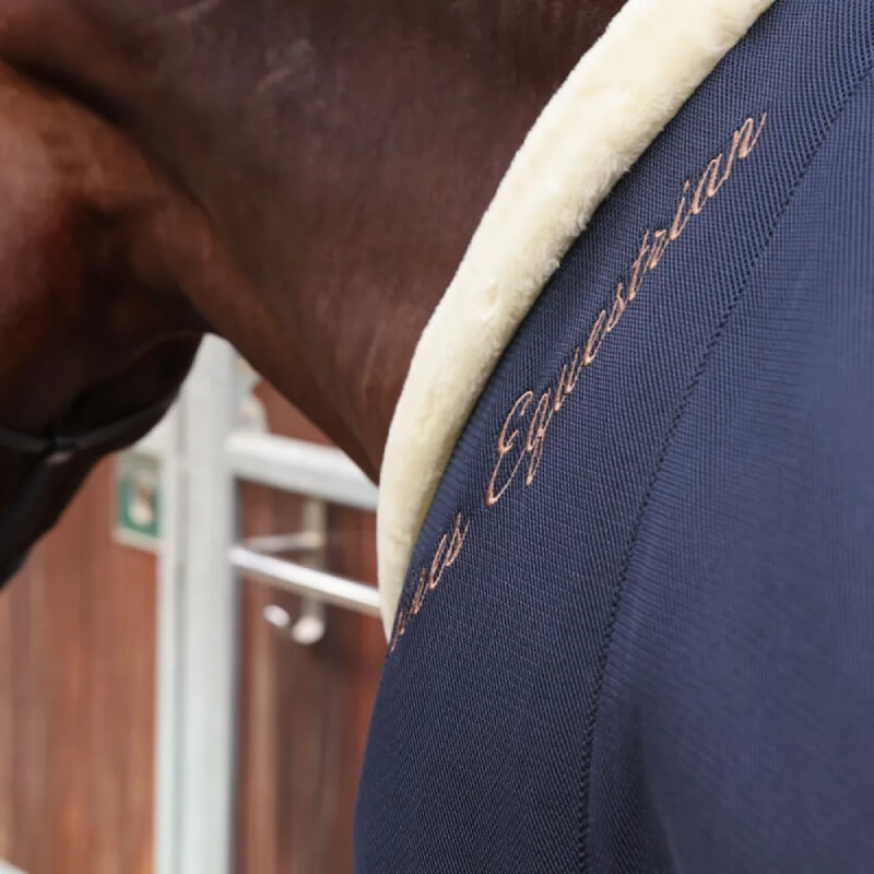 Close-up of a horse wearing the Shires Deluxe Air Motion Cooler Navy, a 3D mesh rug by Shires.