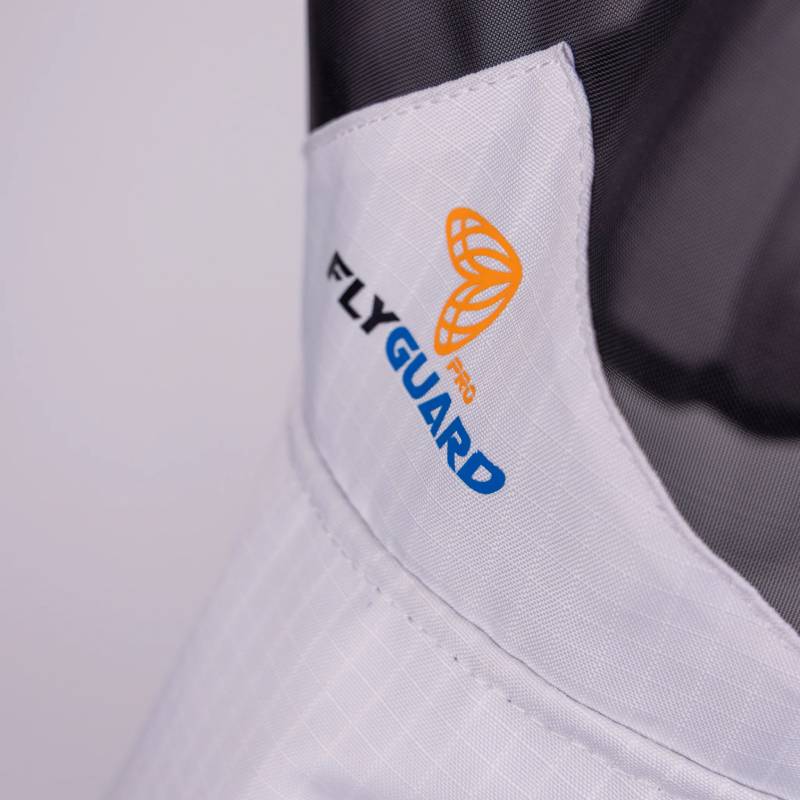 Close-up of Shires FlyGuard Pro Sun Shade Fly Mask with Ears &amp; Nose in white with black mesh.