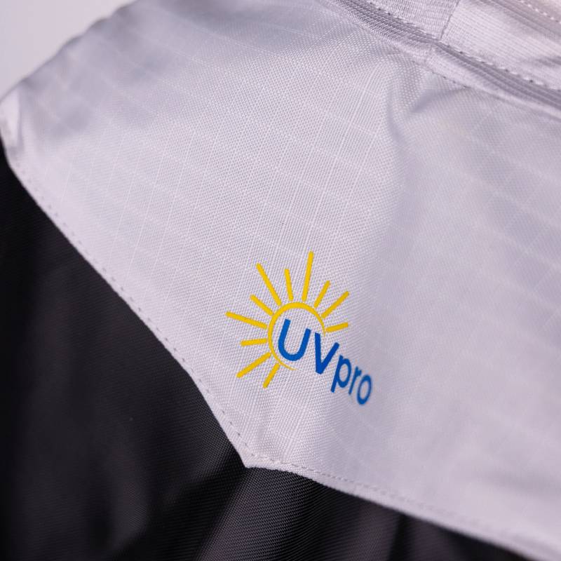 Close-up of a white Shires FlyGuard Pro Sun Shade Fly Mask with Ears &amp; Nose and sun graphic.