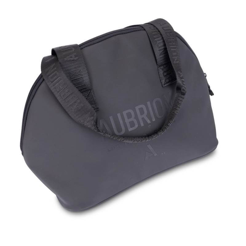 Aubrion React Hat Bag Black with wide branded straps and zipper, angled on white.