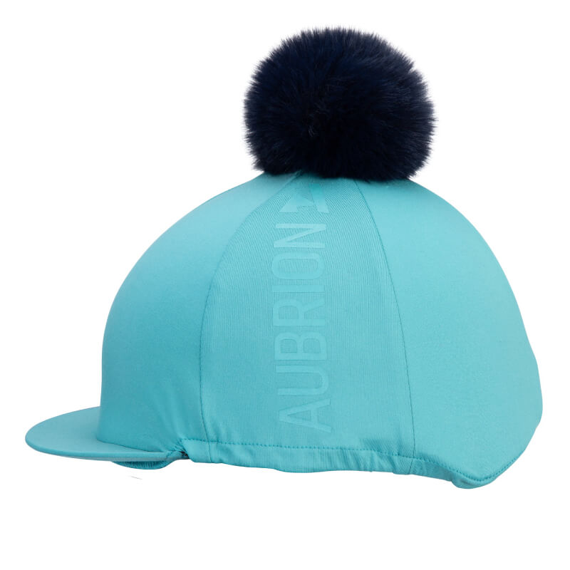 Light blue Aubrion React Hat Silk Haze with a large dark fluffy pom-pom on top.