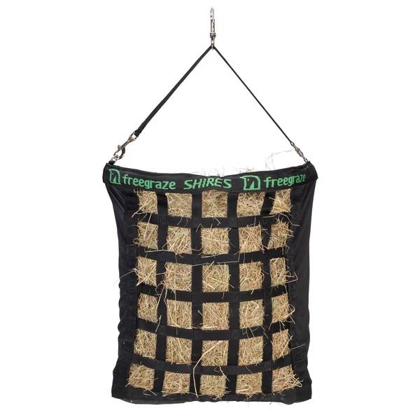 Shires Freegraze Deluxe Web Front Hay Bag—black, slow-feed, hangs via strap and clip.