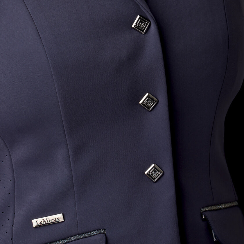 LeMieux Dynamique Show Jacket Ladies Navy with square buttons and metal label above the pocket.