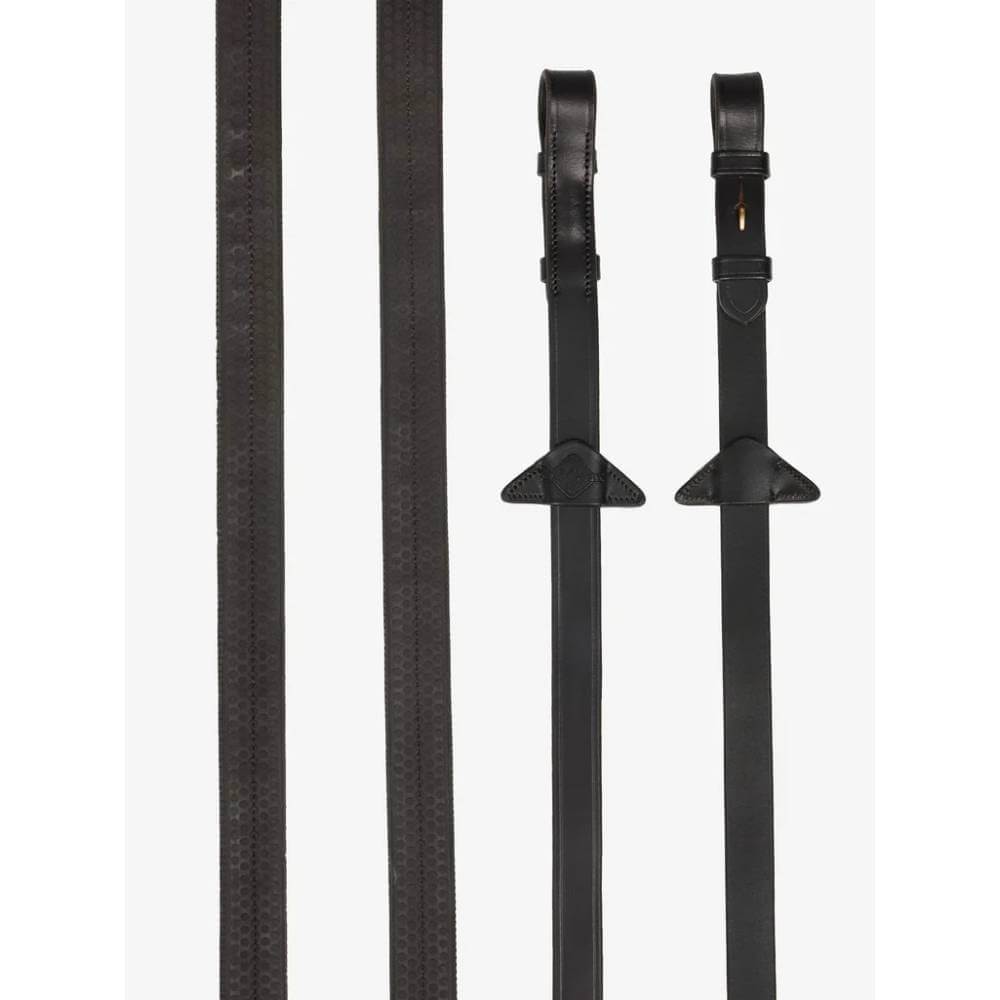 Four LeMieux Rubber Reins in brown with textured grip and buckles, shown vertically.