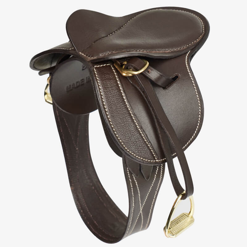 LeMieux Toy Pony Saddle Brown by LeMieux, shown from above with stirrups and brass fittings.
