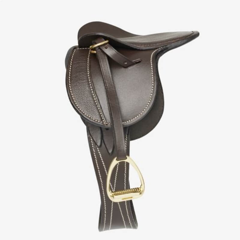 LeMieux Toy Pony Saddle Brown with white stitching and a metal stirrup.