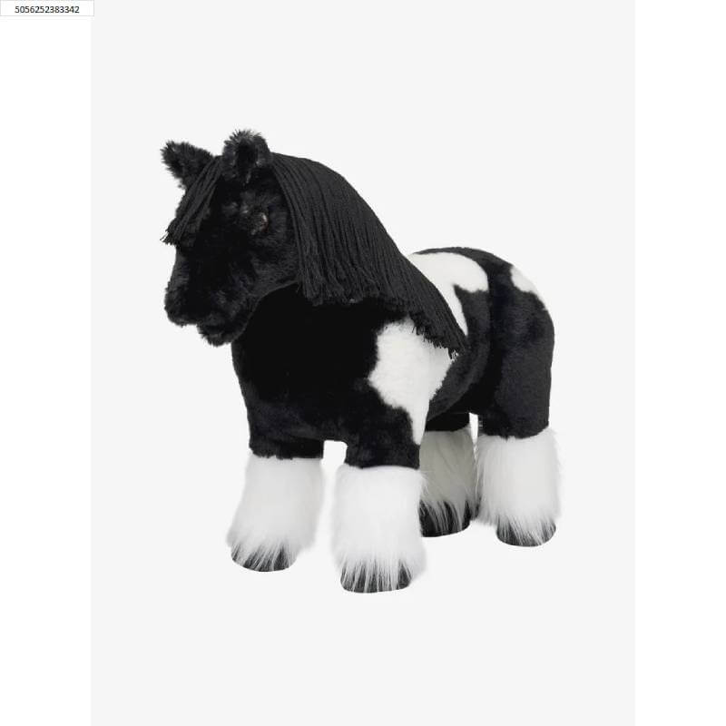 LeMieux Toy Pony Razzle: a plush piebald pony with fluffy legs and a long black mane.