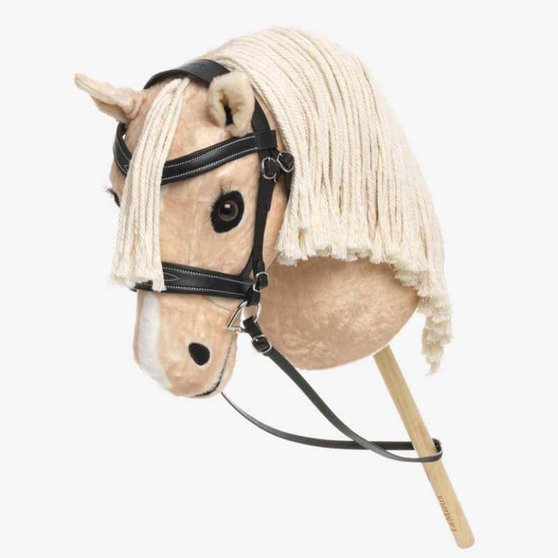 A beige plush hobby horse with black LeMieux Competition Bridle and a yarn mane.
