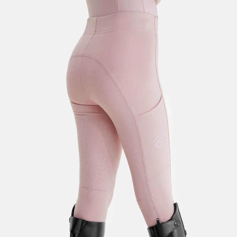 Person in Aztec Diamond YR Full Seat Leggings Pink and black boots, shown from the back.