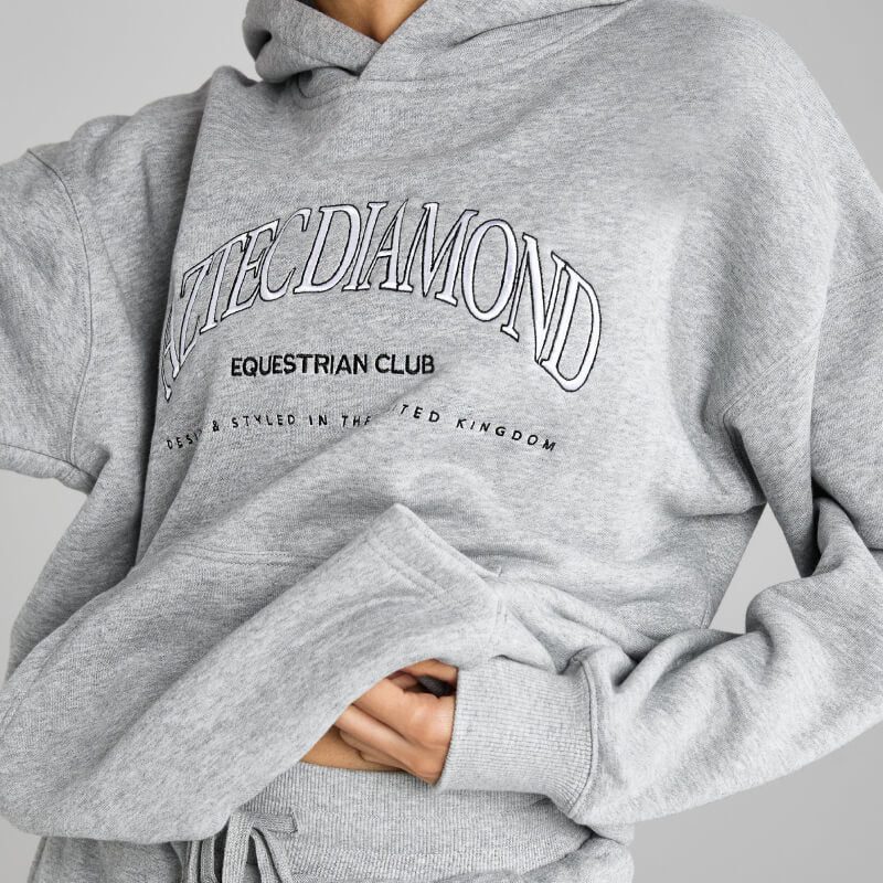 Person wearing the Aztec Diamond EQ Club Pull on Hoodie Grey Marl by Aztec Diamond.