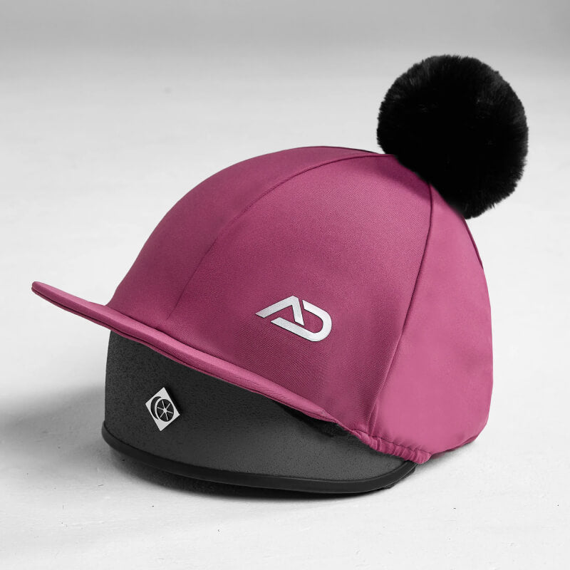 Aztec Diamond YR Pom Hat Silk Raspberry with black pom-pom and white logo for juniors.