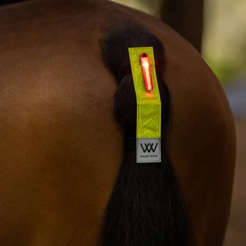 Woof Wear LED Hi Vis Tail Light Yellow adds visibility with an LED light and reflective strip.