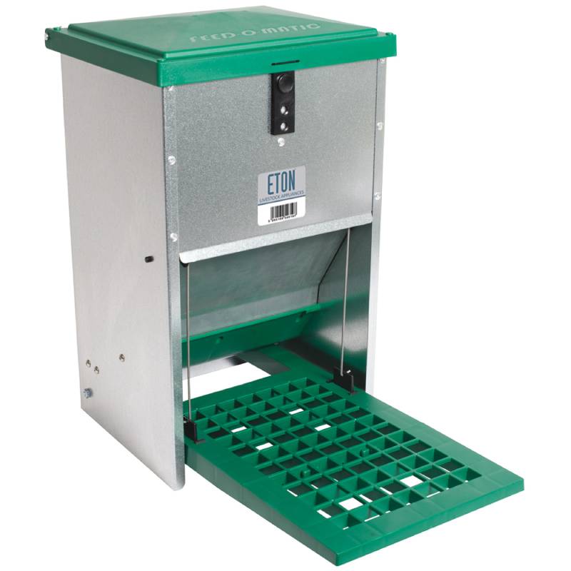 Eton Treadle Poultry Feeder 8kg, green plastic and metal with foot pedal and FEED O MATIC lid.