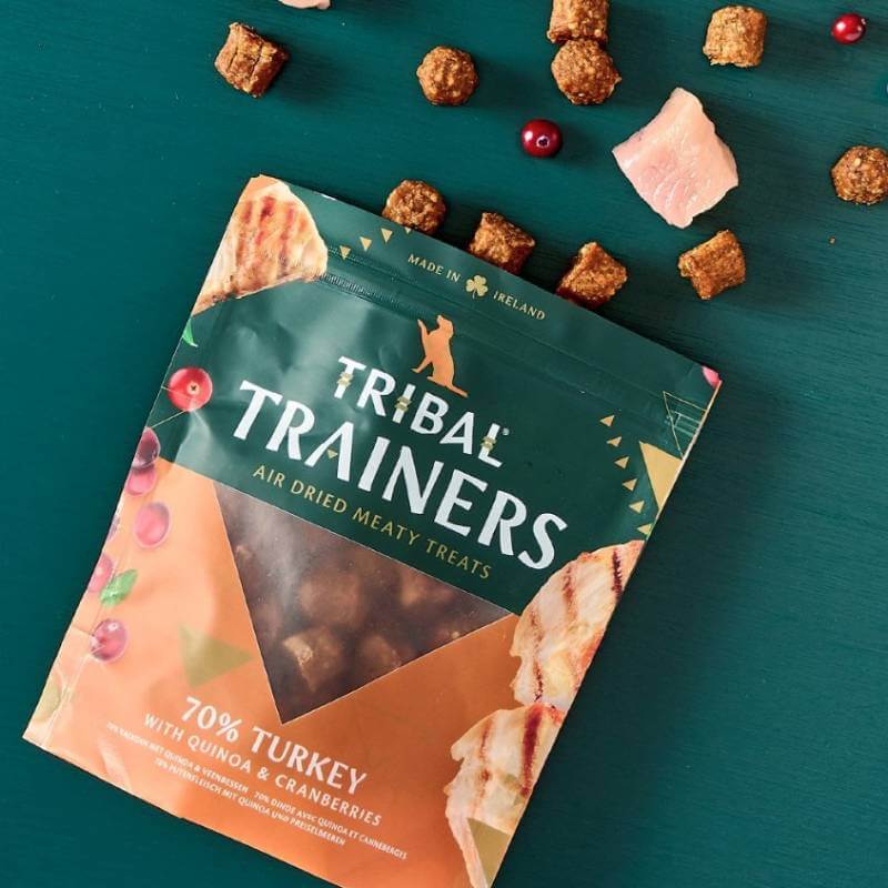 Tribal Trainers Dog Treats Turkey &amp; Cranberry 80g, with treats, cranberries, and turkey pieces.