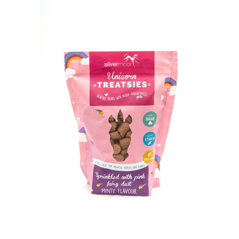 A pink bag of Silvermoor Unicorn Treatsies, low sugar horse treats with rainbow and cloud designs.