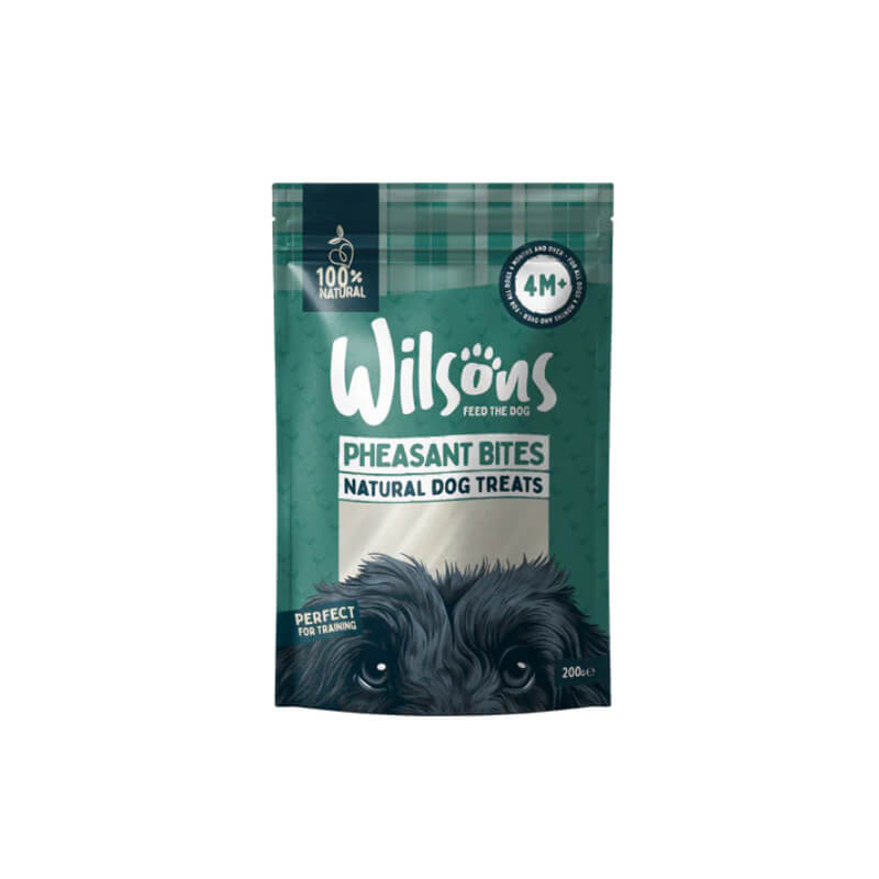 Wilsons Natural Dog Treats Pheasant Bites 200g bag with dog image and natural treats text.