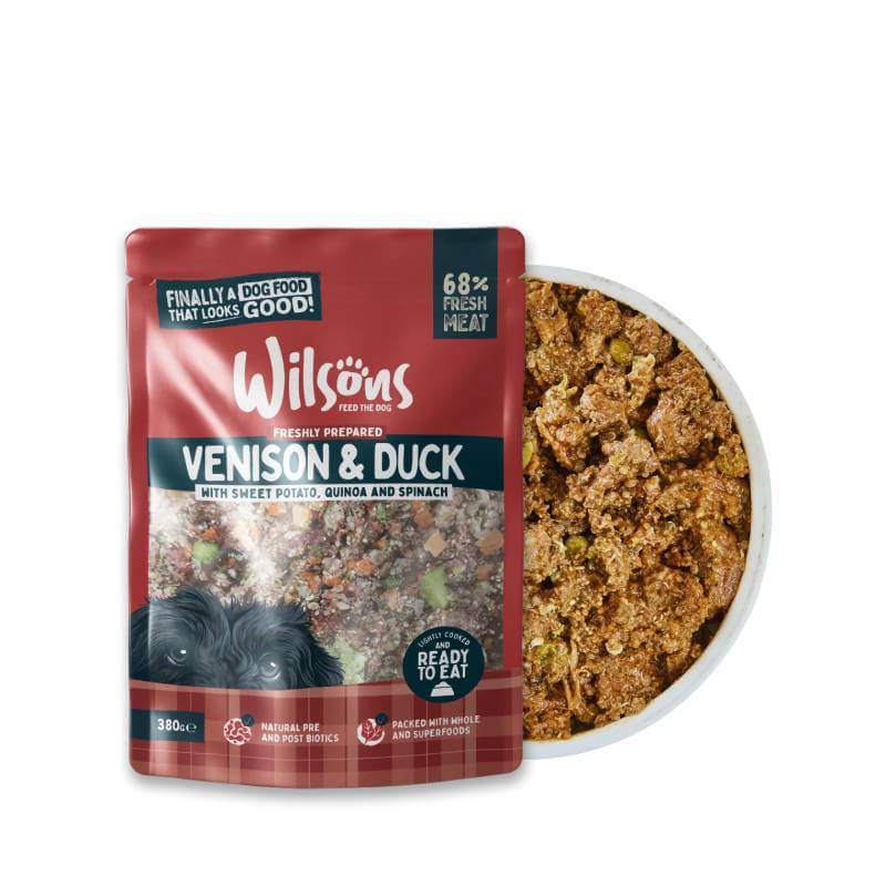 Wilsons Premium Fresh Dog Food Venison &amp; Duck 380g for sensitive stomachs, bowl nearby.