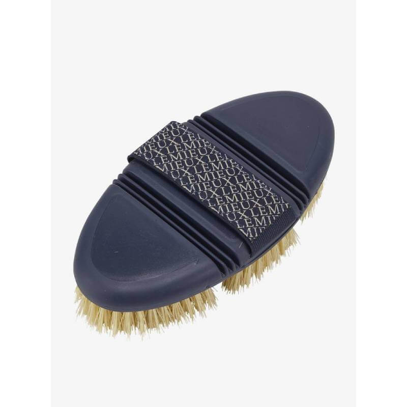 LeMieux Flexi Scrubbing Brush Navy: stiff oval bristles, patterned grip, ergonomic dark handle.