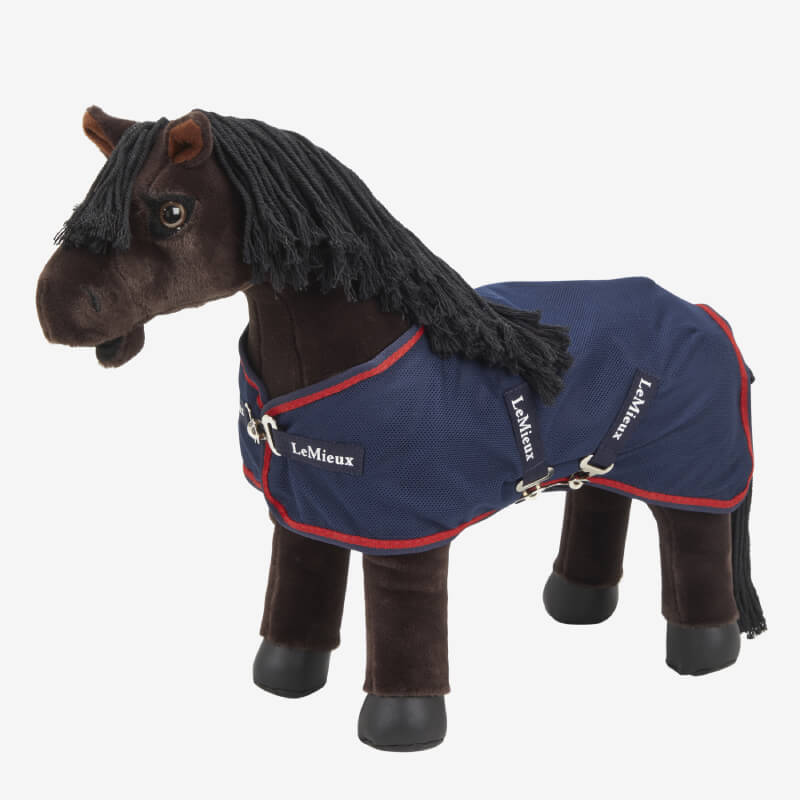 LeMieux Toy Pony wearing Mesh Cooler Navy blanket by LeMieux with red trim.