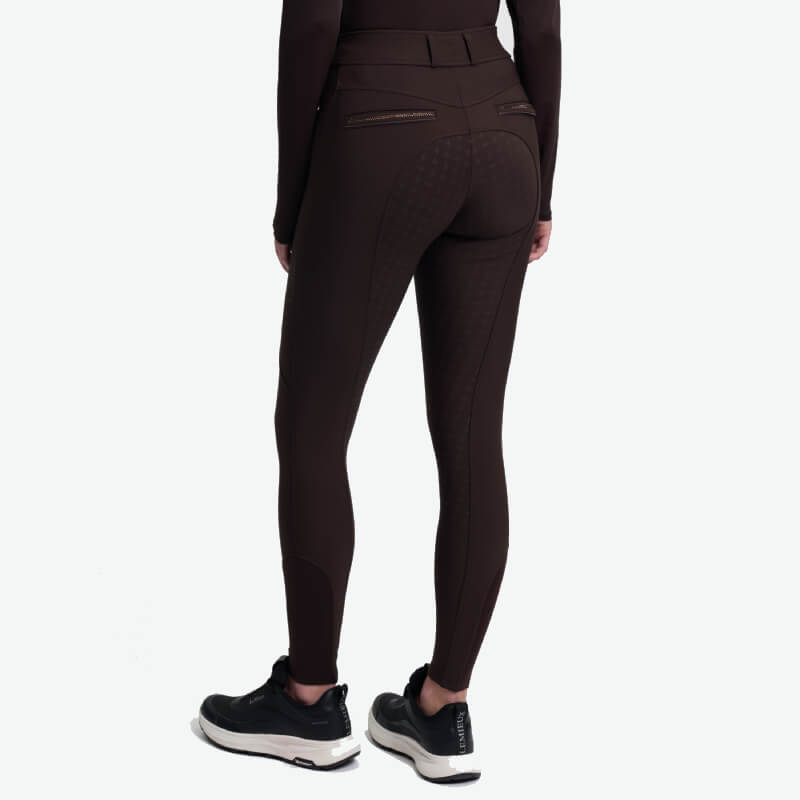 Person wearing LeMieux Brilliance Full Seat Breeches Espresso, shown from the back on white.