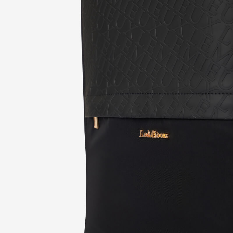 Close-up of the LeMieux Luxe Boot Bag Black with embossed lettering and gold logo.