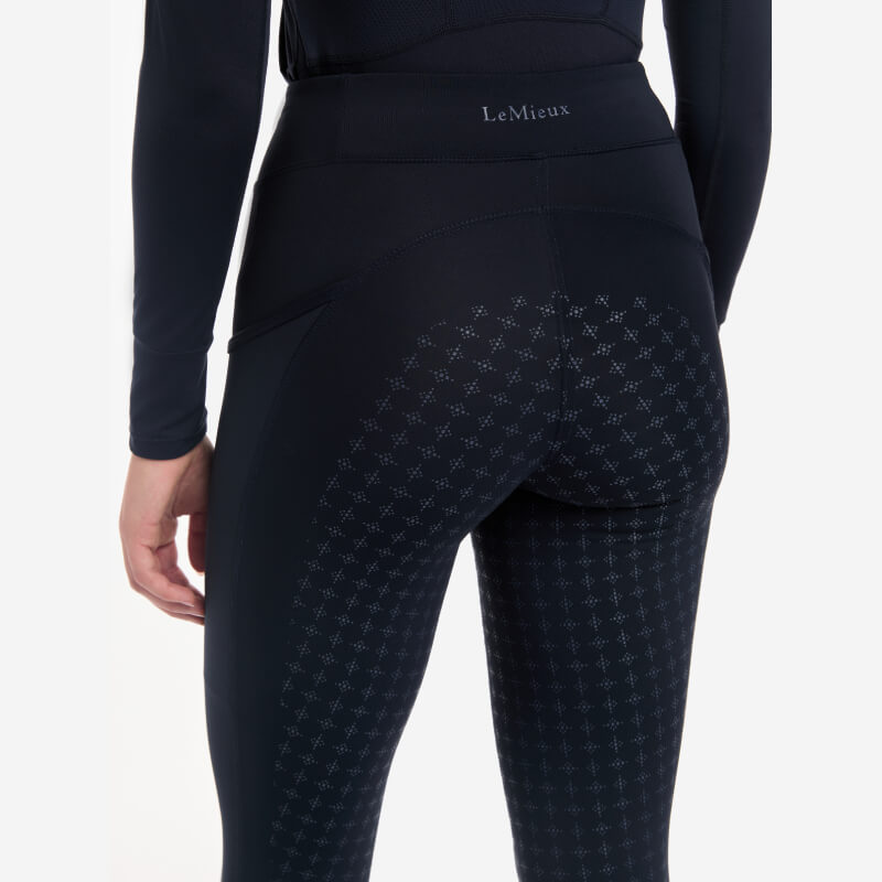 Person wearing LeMieux Naomi Pull On Breech Navy Full Seat by LeMieux.