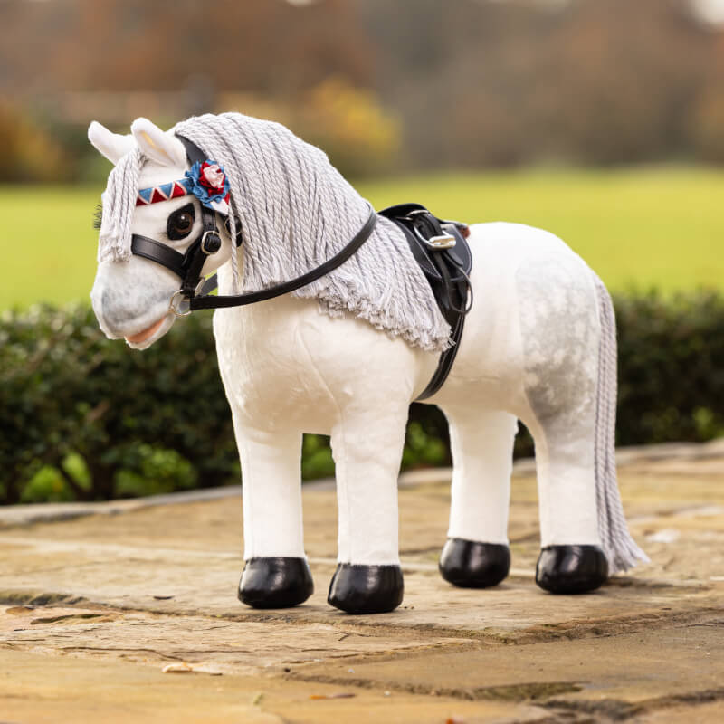 LeMieux Show Pony Coco White: a plush white horse with black saddle and decorative bridle.