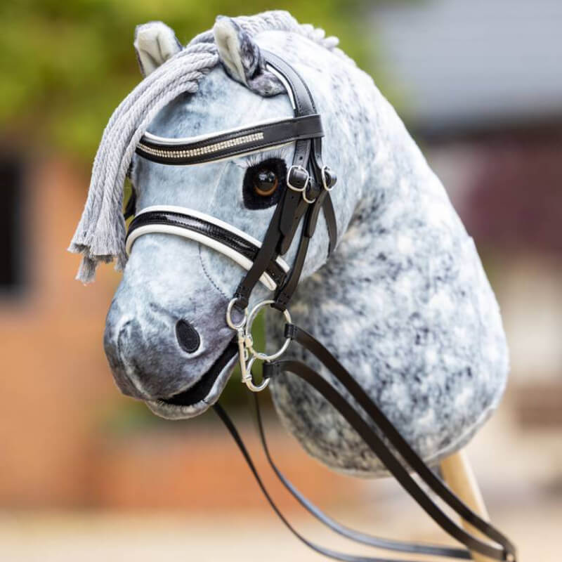 LeMieux Hobby Horse with double bridle in black and yarn mane on a stick.
