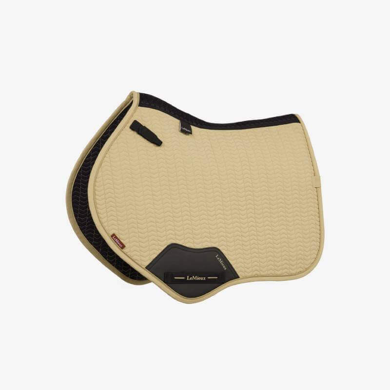 LeMieux Essence Pear close contact pad: beige quilted, black/gold label, trimmed curved edges.